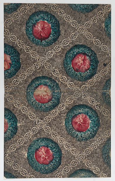 Book cover with circular designs and ornamental diagonal pattern