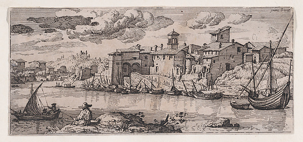 Fishermen on a river across from a town