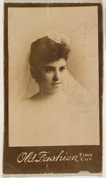 Actress wearing lace headpiece, from the Actresses series (N664) promoting Old Fashion Fine Cut Tobacco