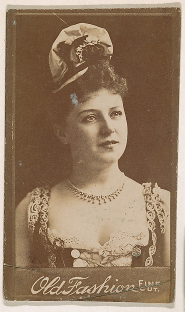 Actress wearing floral hat, from the Actresses series (N664) promoting Old Fashion Fine Cut Tobacco