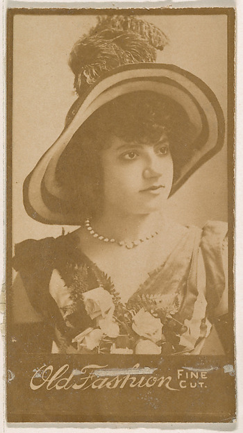 Actress wearing wide-brimmed hat with feathers, from the Actresses series (N664) promoting Old Fashion Fine Cut Tobacco
