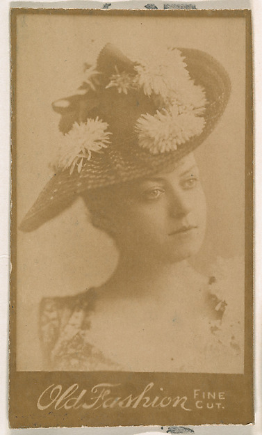 Actress wearing floral hat, from the Actresses series (N664) promoting Old Fashion Fine Cut Tobacco