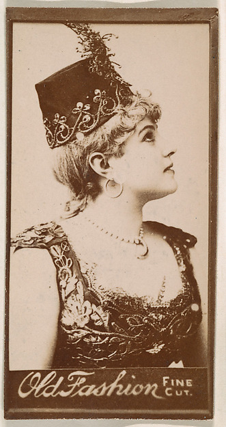 Actress wearing feathered bodice, from the Actresses series (N664) promoting Old Fashion Fine Cut Tobacco