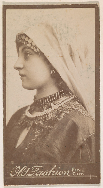 Actress wearing cloth headpiece, from the Actresses series (N664) promoting Old Fashion Fine Cut Tobacco