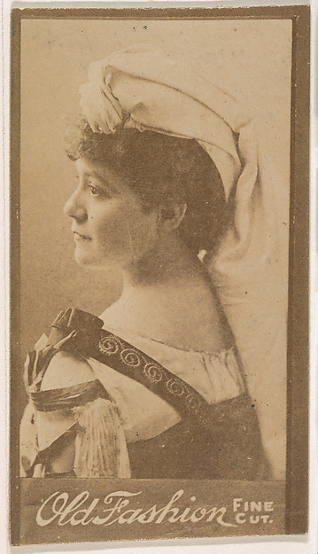 Portrait wearing cloth turban, from the Actresses series (N664) promoting Old Fashion Fine Cut Tobacco