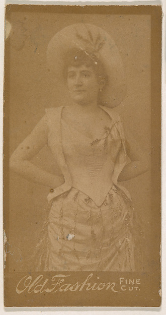 Actress standing with hands on hips, from the Actresses series (N664) promoting Old Fashion Fine Cut Tobacco