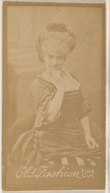 Actress with finger held to lips, from the Actresses series (N664) promoting Old Fashion Fine Cut Tobacco