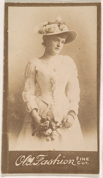 Actress holding floral bouquet, from the Actresses series (N664) promoting Old Fashion Fine Cut Tobacco