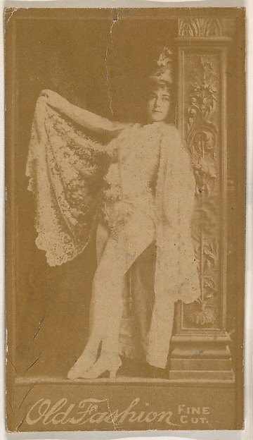 Actress leaning against column, from the Actresses series (N664) promoting Old Fashion Fine Cut Tobacco