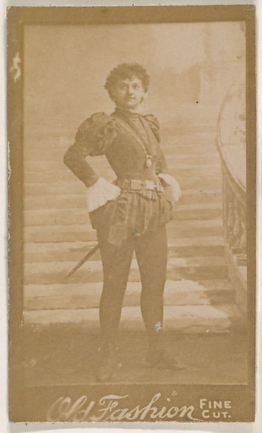Actress wearing costume with sword, from the Actresses series (N664) promoting Old Fashion Fine Cut Tobacco