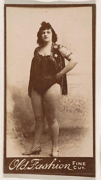 Standing actress, from the Actresses series (N664) promoting Old Fashion Fine Cut Tobacco