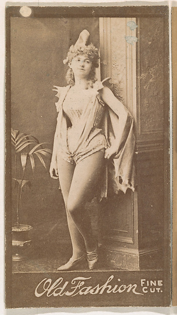 Actress leaning against column, from the Actresses series (N664) promoting Old Fashion Fine Cut Tobacco