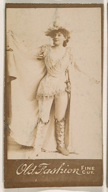 Actress posing with arms aloft, from the Actresses series (N664) promoting Old Fashion Fine Cut Tobacco