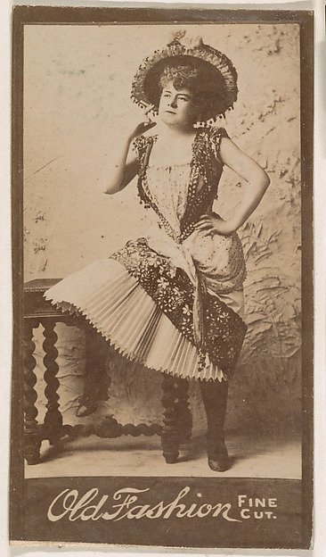 Actress standing with hand on hip, from the Actresses series (N664) promoting Old Fashion Fine Cut Tobacco