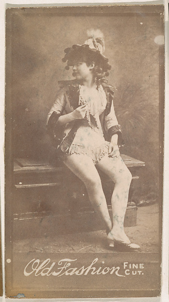 Actress seated on bench, from the Actresses series (N664) promoting Old Fashion Fine Cut Tobacco