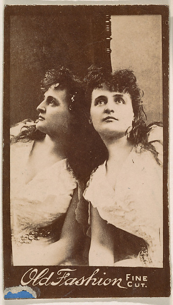 Actress posing with reflection in mirror, from the Actresses series (N664) promoting Old Fashion Fine Cut Tobacco