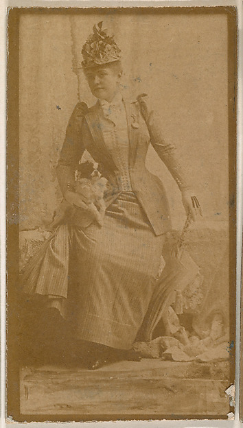 Actress holding dog and parasol, from the Actresses series (N664) promoting Old Fashion Fine Cut Tobacco
