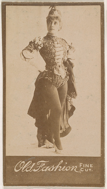 Actress standing with hands on hips, from the Actresses series (N664) promoting Old Fashion Fine Cut Tobacco
