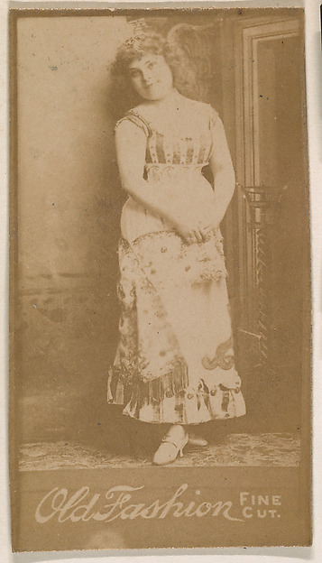 Actress standing with hands clasped at waist, from the Actresses series (N664) promoting Old Fashion Fine Cut Tobacco