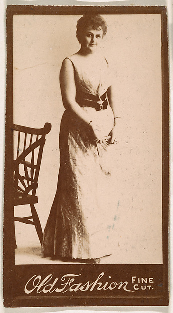Actress standing next to chair, from the Actresses series (N664) promoting Old Fashion Fine Cut Tobacco