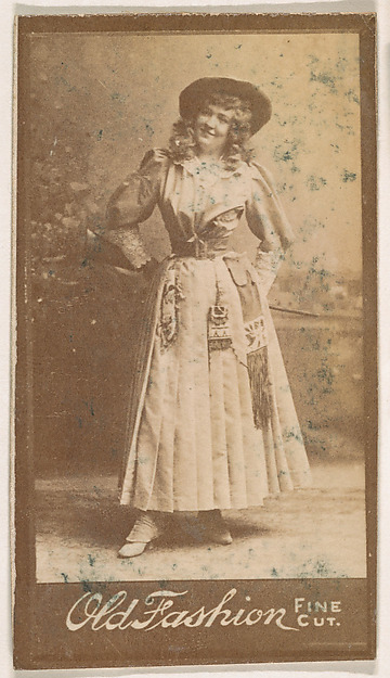 Actress standing with hands behind back, from the Actresses series (N664) promoting Old Fashion Fine Cut Tobacco