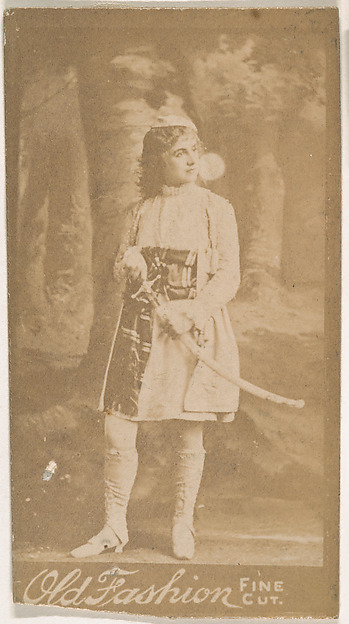 Actress wearing costume with sword, from the Actresses series (N664) promoting Old Fashion Fine Cut Tobacco