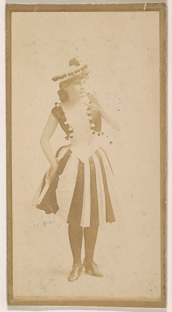 Actress wearing striped skirt, from the Actresses series (N664) promoting Old Fashion Fine Cut Tobacco