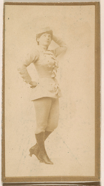 Actress leaning against wall, from the Actresses series (N664) promoting Old Fashion Fine Cut Tobacco