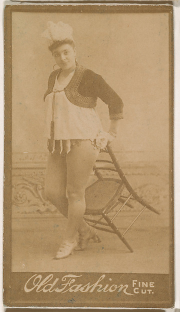 Actress posing with tilted chair, from the Actresses series (N664) promoting Old Fashion Fine Cut Tobacco