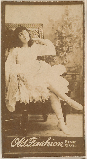 Actress seated in chair, from the Actresses series (N664) promoting Old Fashion Fine Cut Tobacco