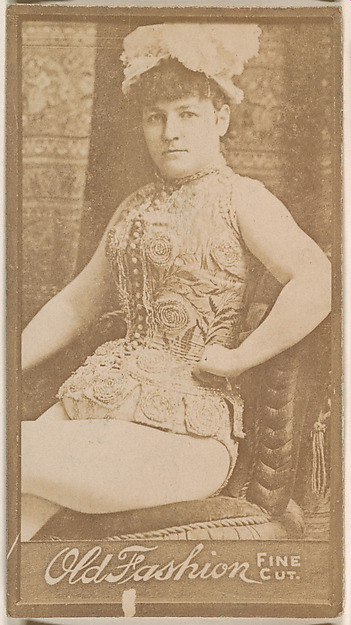 Actress seated in chair, from the Actresses series (N664) promoting Old Fashion Fine Cut Tobacco