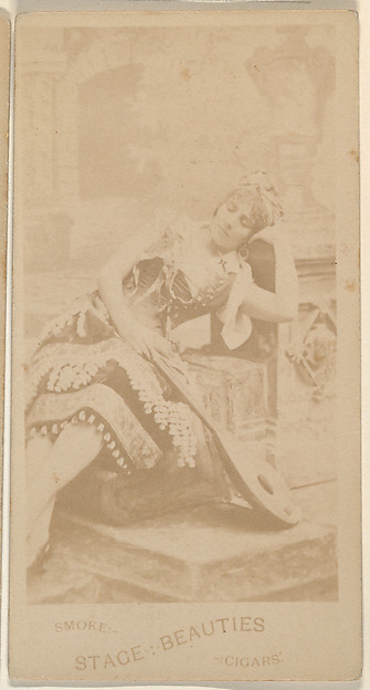 Actress reclining on chair, from the Actresses series (N666) to promote Stage Beauties Cigars
