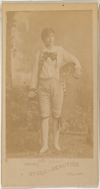 Actress standing with hat on hip, from the Actresses series (N666) to promote Stage Beauties Cigars