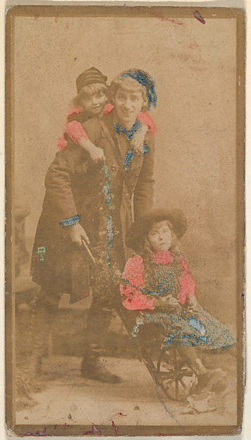 Actress posing with two children, from the Actresses series (N668)