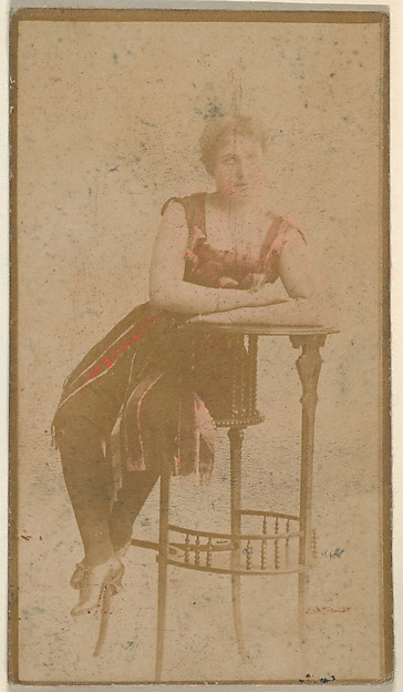 Seated actress leaning on table, from the Actresses series (N668)