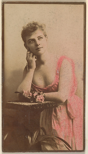 Actress wearing hand-colored pink dress, from the Actresses series (N668)
