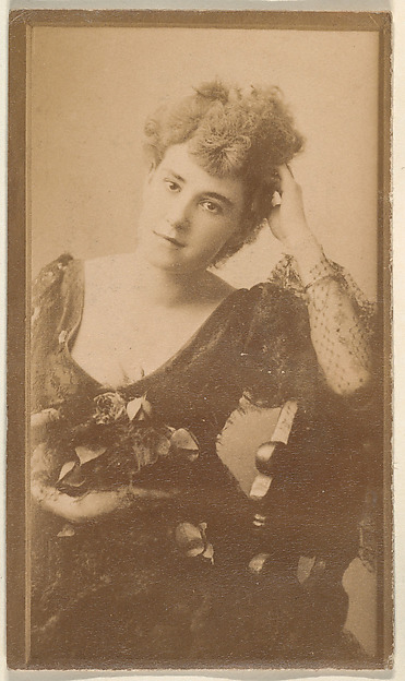 Seated actress leaning elbow on back of chair, from the Actresses series (N668)