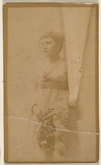 Actress holding headpiece of floral vines, from the Actresses series (N668)