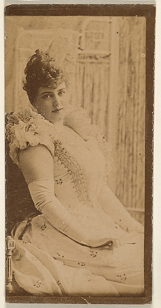 Seated actress wearing long white gloves, from the Actresses series (N668)