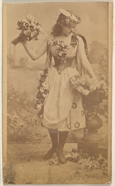 Actress holding bouquet of flowers, from the Actresses series (N668)