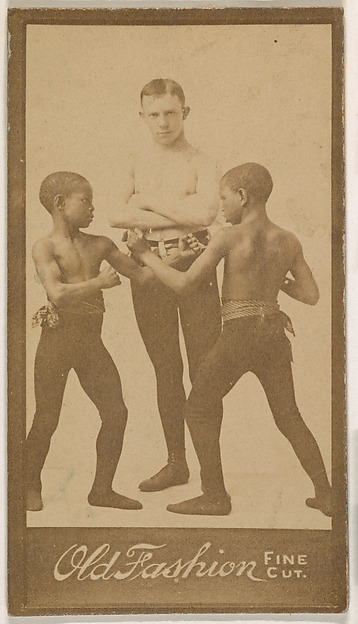 Man standing with two children boxing, from the "Negro Subjects" series (N692) promoting Old Fashion Fine Cut Tobacco