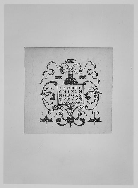 Alphabet Surrounded by Decorative Ornamentation