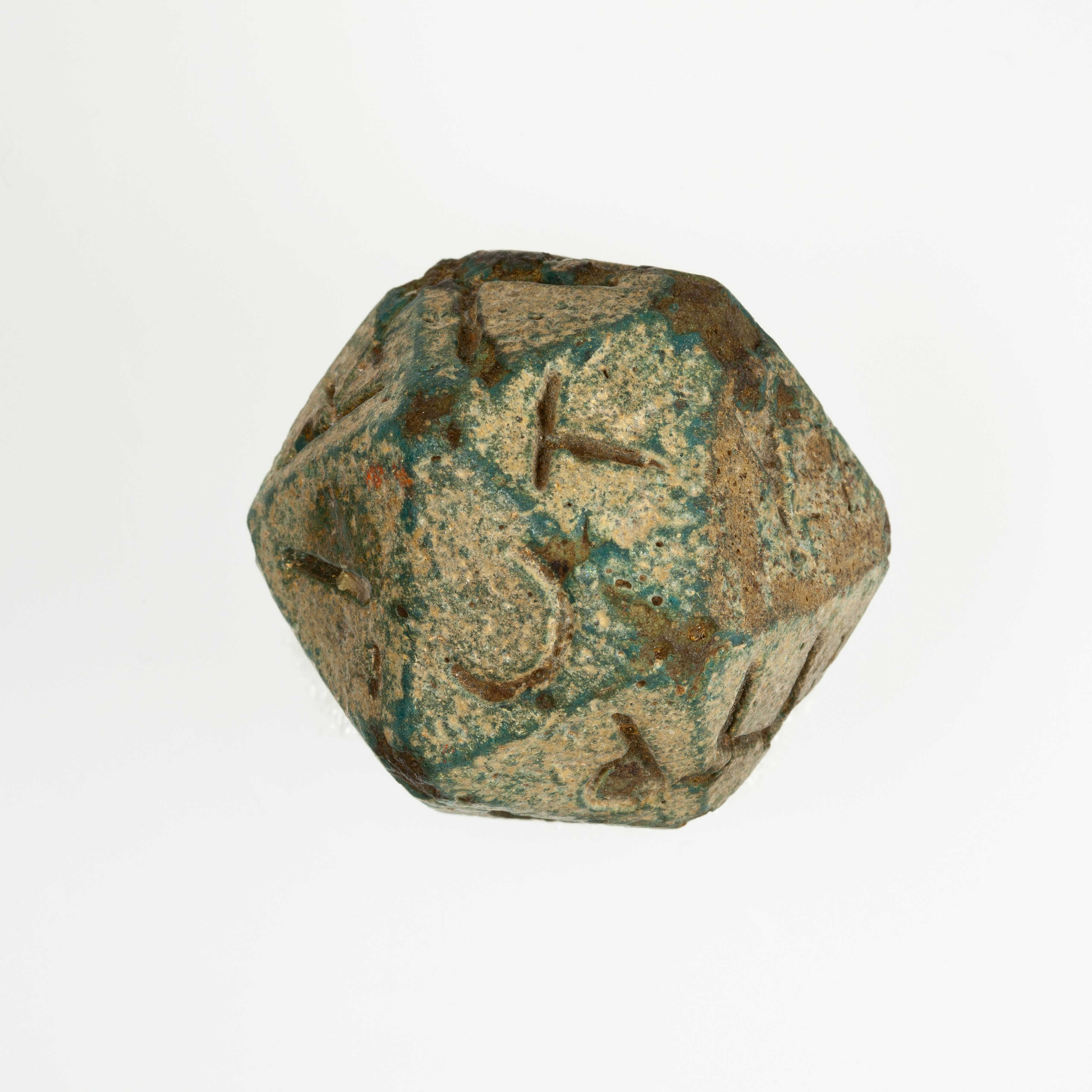Twenty sided die (icosahedron) with faces inscribed with Greek letters