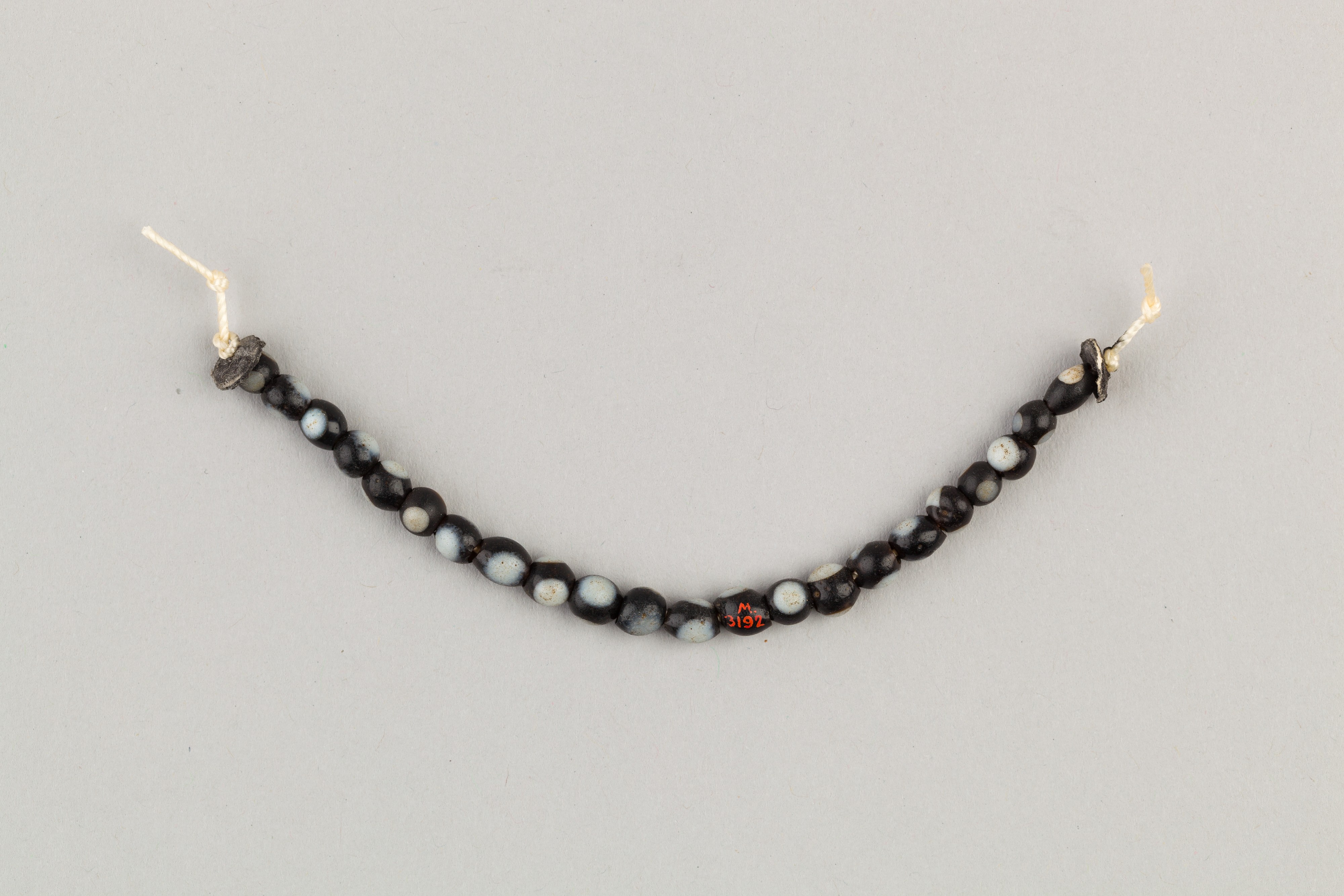 String of 22 eyed beads