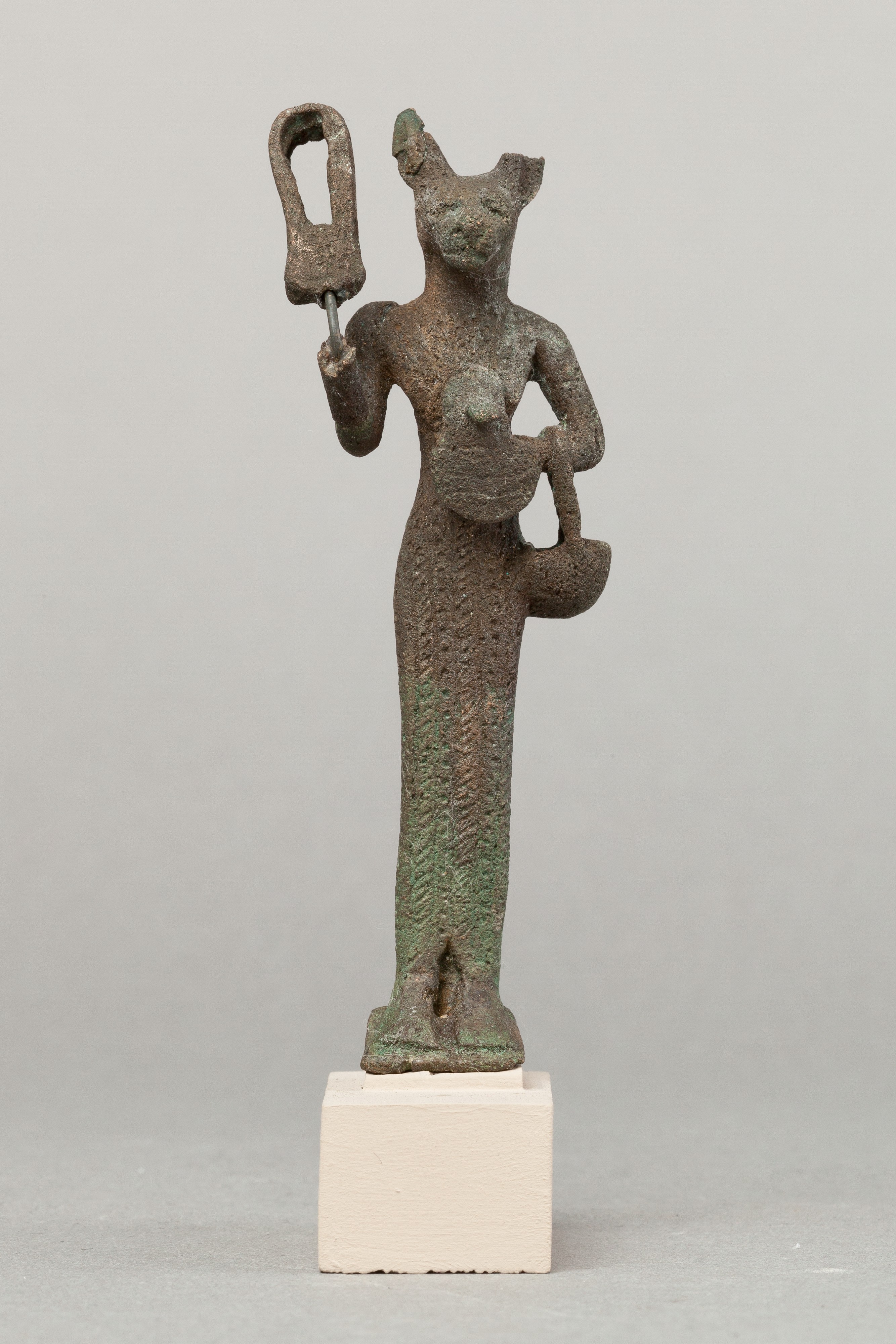 Cupreous metal figure of Bastet holding a sistrum.