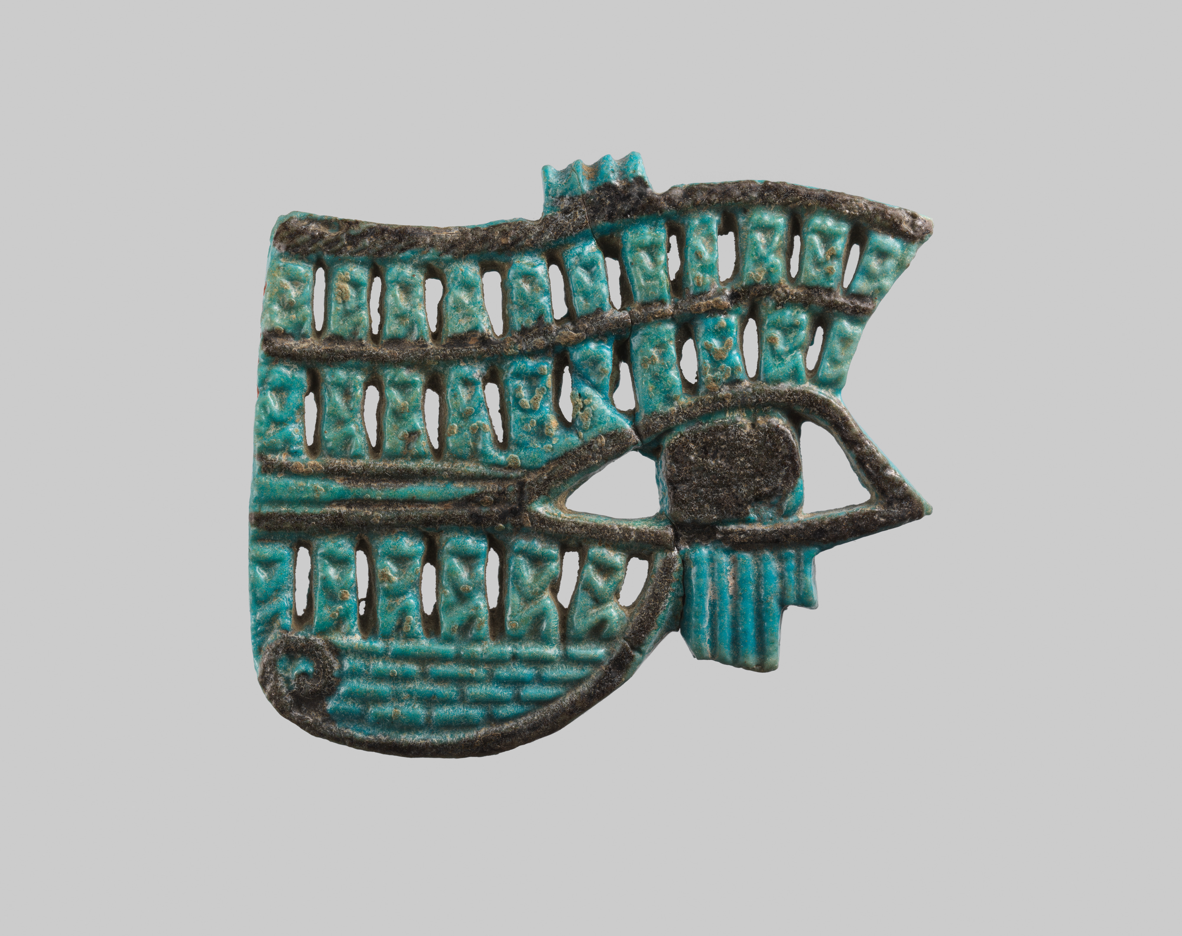 <em>Wedjat</em> eye amulet with baboons