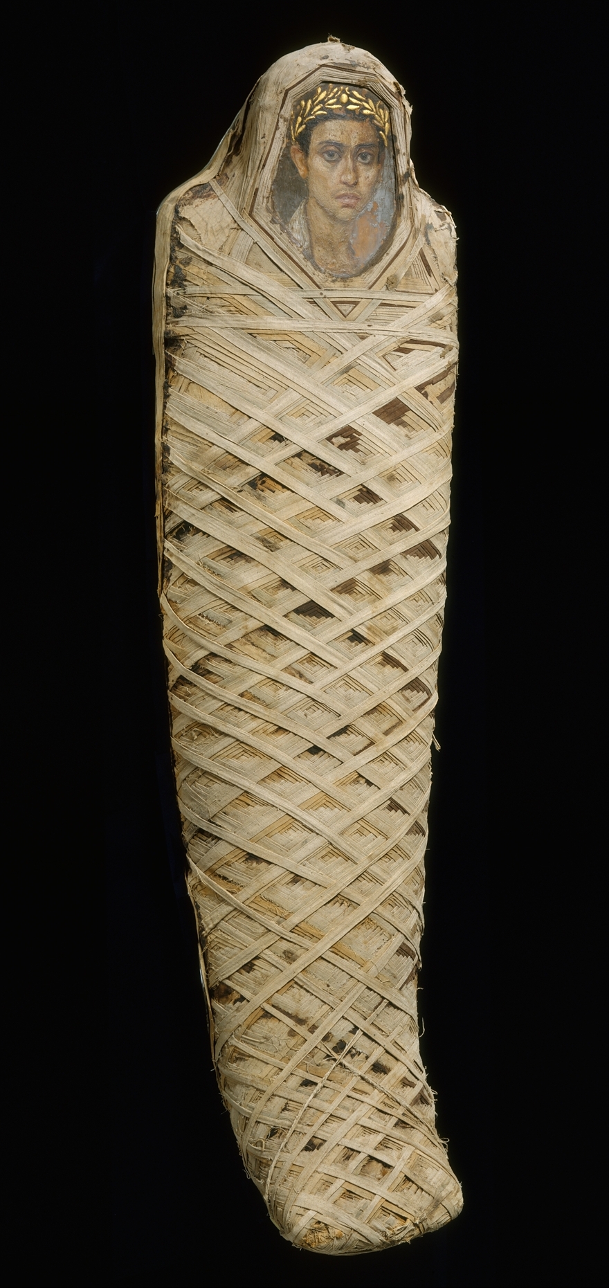 Mummy Wrapping Of A Young Boy