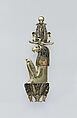 Pendant showing the sun god as a ram-headed man, Material: electrum<br/>Secondary material: glass<br/>Technique: engraving, inlay, cut relief<br/>Colour: royal blue