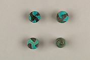 Seven Spool-Shaped Gaming Pieces, Faience