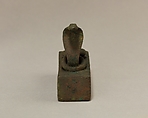 Box for an animal mummy surmounted by a coiled, rearing snake, Cupreous metal